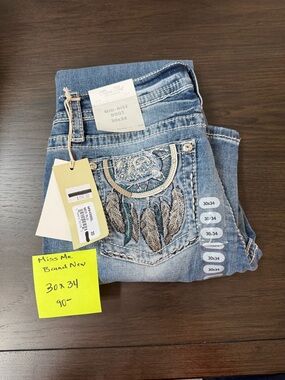 Miss Me Light Blue Mid-Rise Bootcut Jeans with Embroidered Feather Pocket